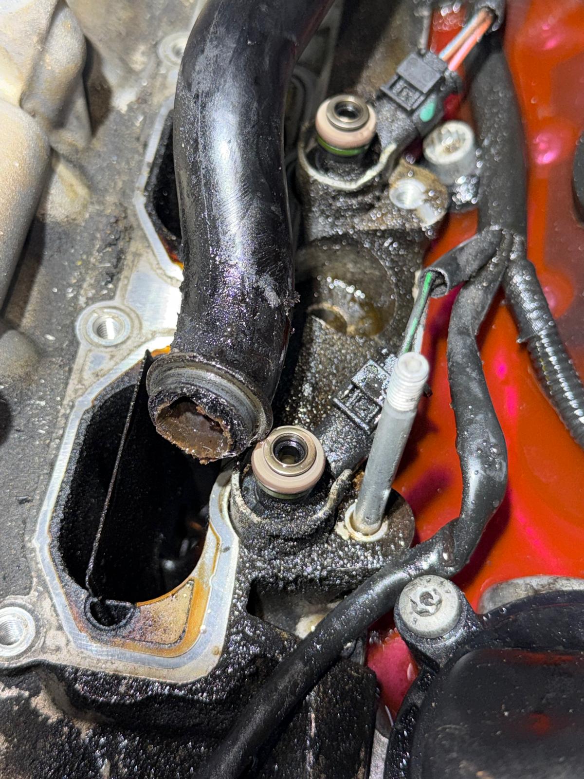 Damaged Audi Q7 coolant pipe discovered during repair