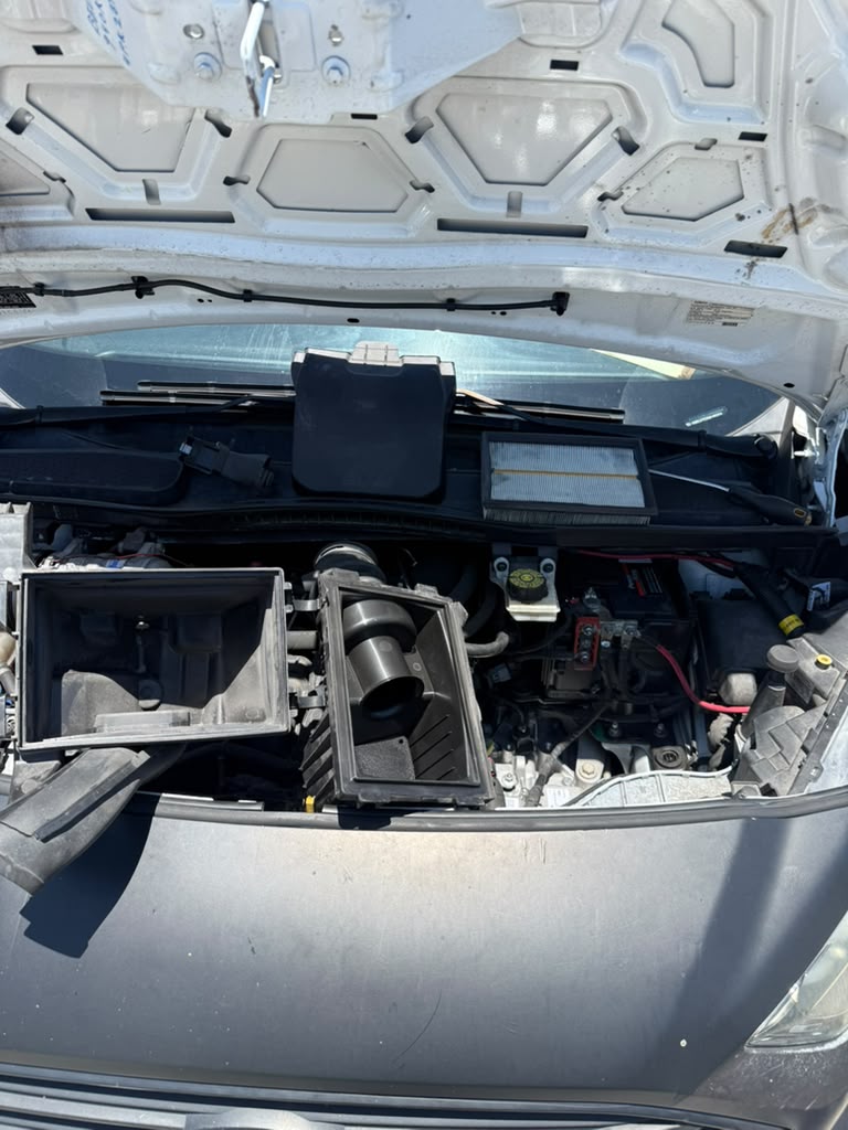 Ford Transit Connect engine bay during battery service