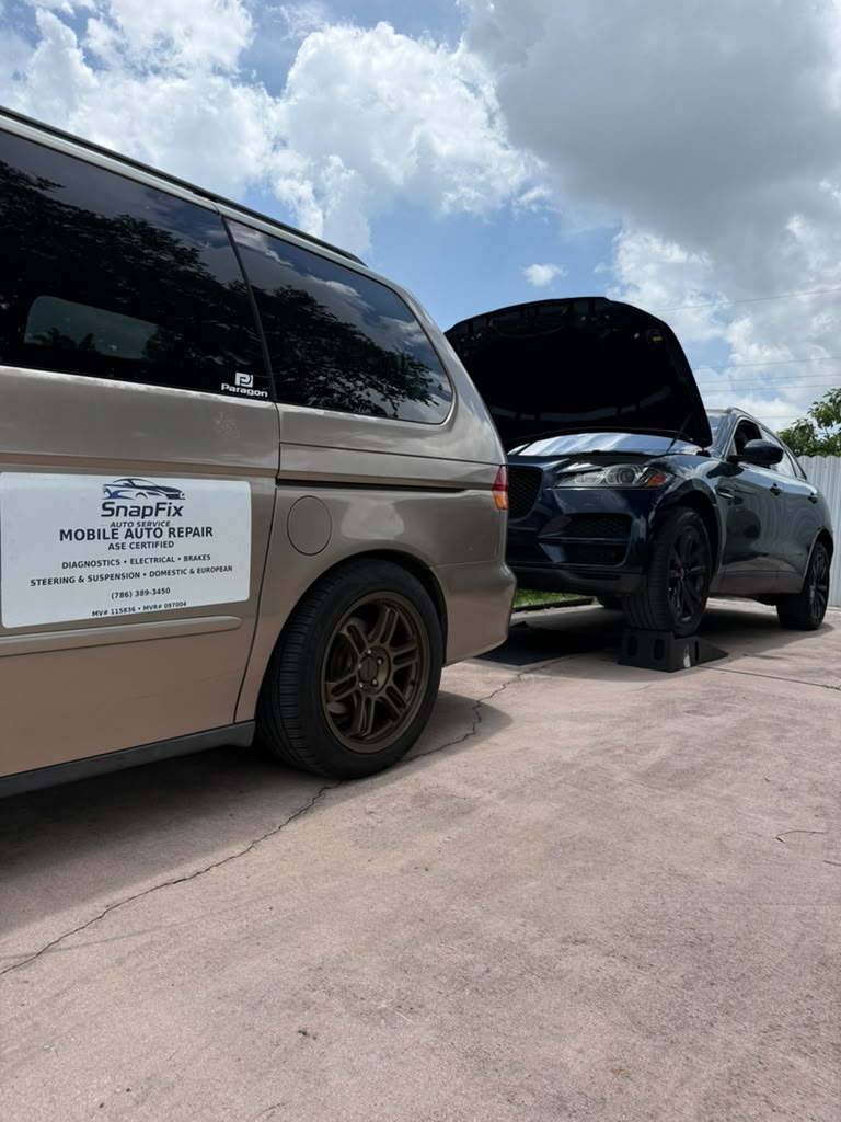 SnapFix mobile service van working on a customer vehicle