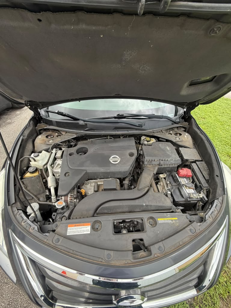 Engine bay reviewed during the Nissan Altima inspection
